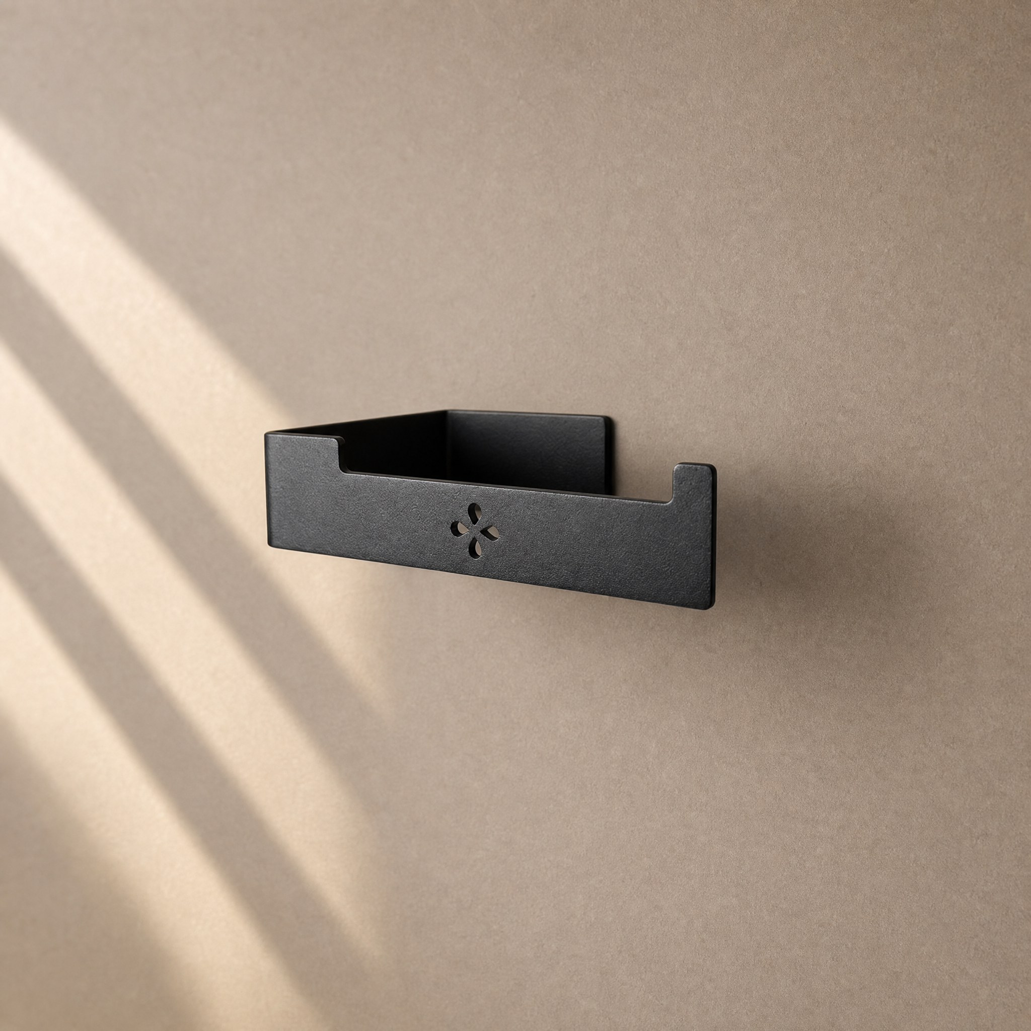 Toilettenpapierhalter in Schwarz matt ohne Papierrolle an der Wand