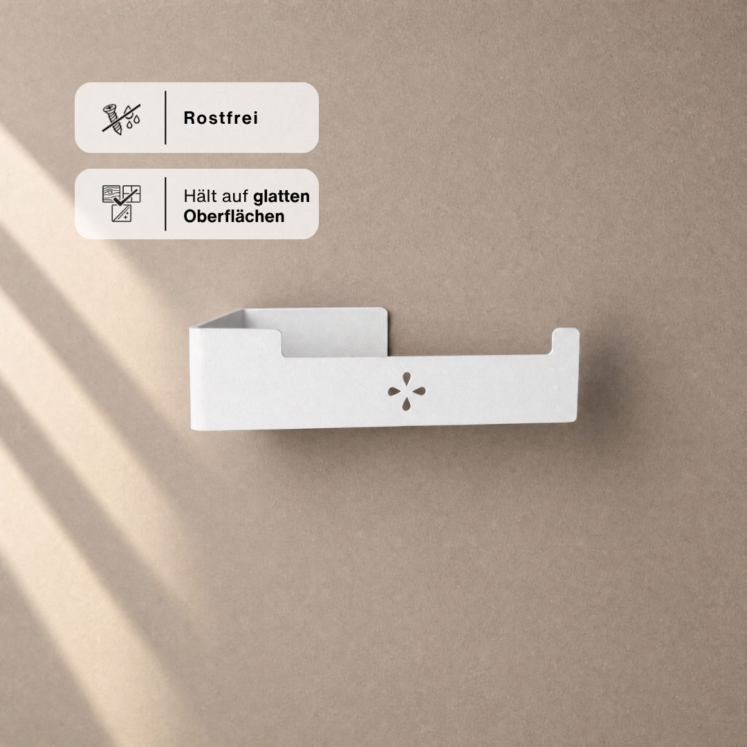 Toilettenpapierhalter in Weiß matt frontal, Hinweise: rostfrei und hält auf glatten Oberflächen