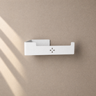 Toilettenpapierhalter in Weiß matt ohne Rolle an der Wand